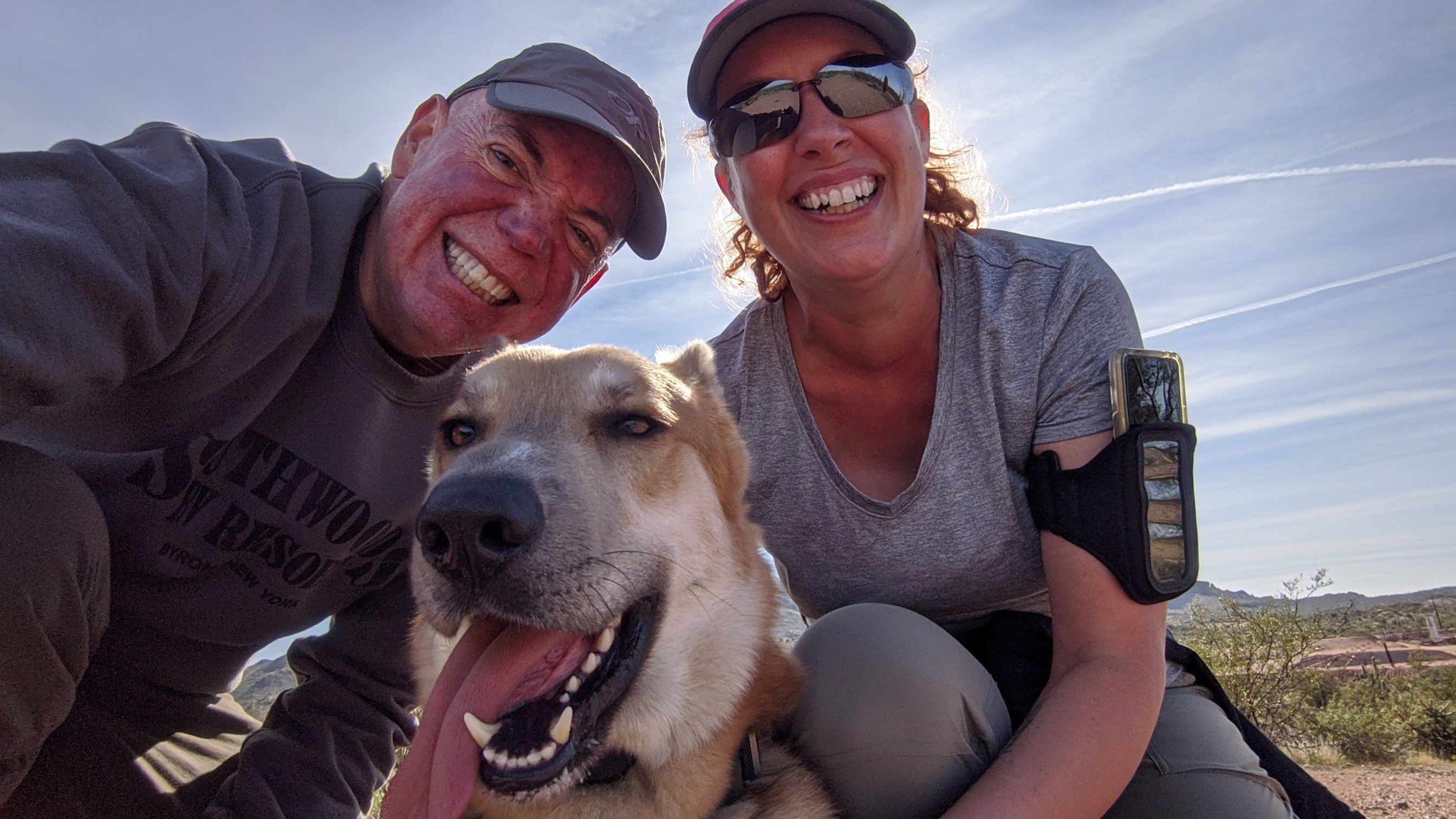 Prostate cancer survivor David Bott, with his wife Brenda and service dog Loki in Fort McDowell, Arizona, in 2019