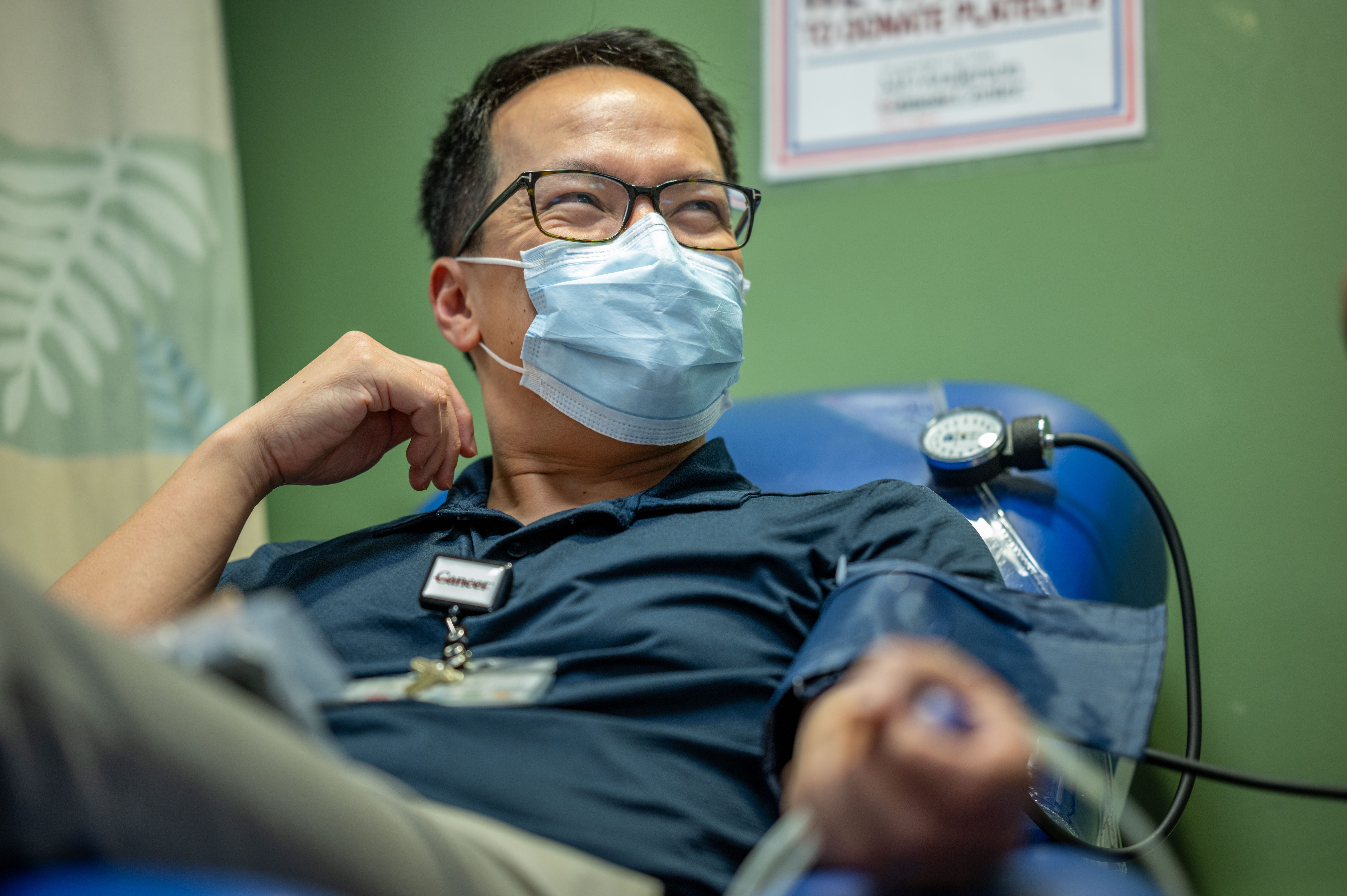 Dr. Hop Tran Cao donating blood.