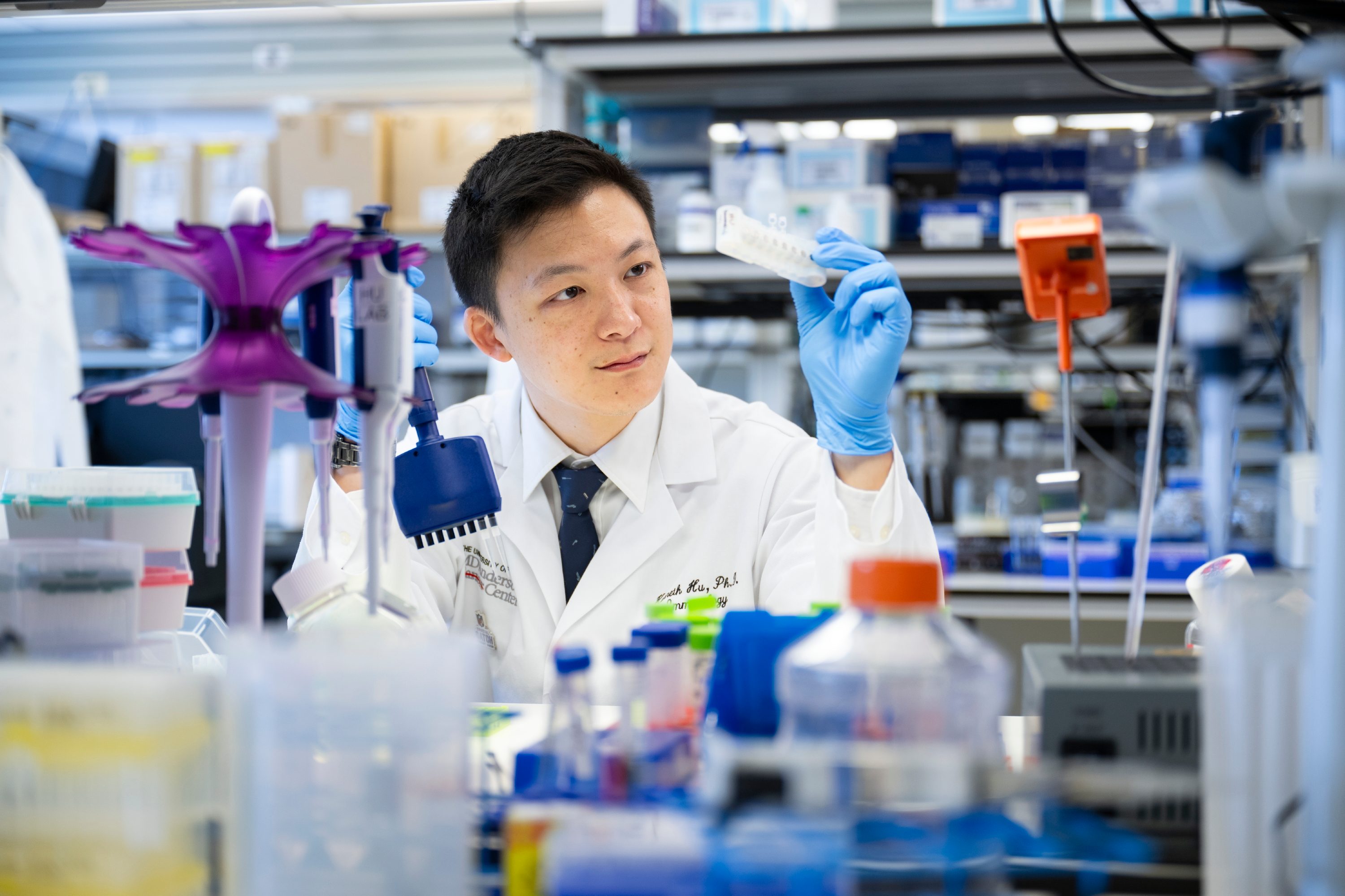 Dr. Kenneth Hu in his lab