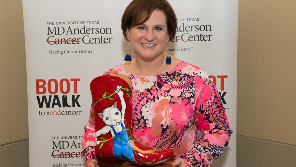 Breast cancer survivor Shannon Hillegeist, with her 2017 Boot Walk fundraising award