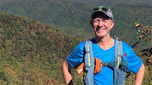 MDS survivor Jon Hendren on a woody hilltop in Pisgah National Forest in Oct. 2020
