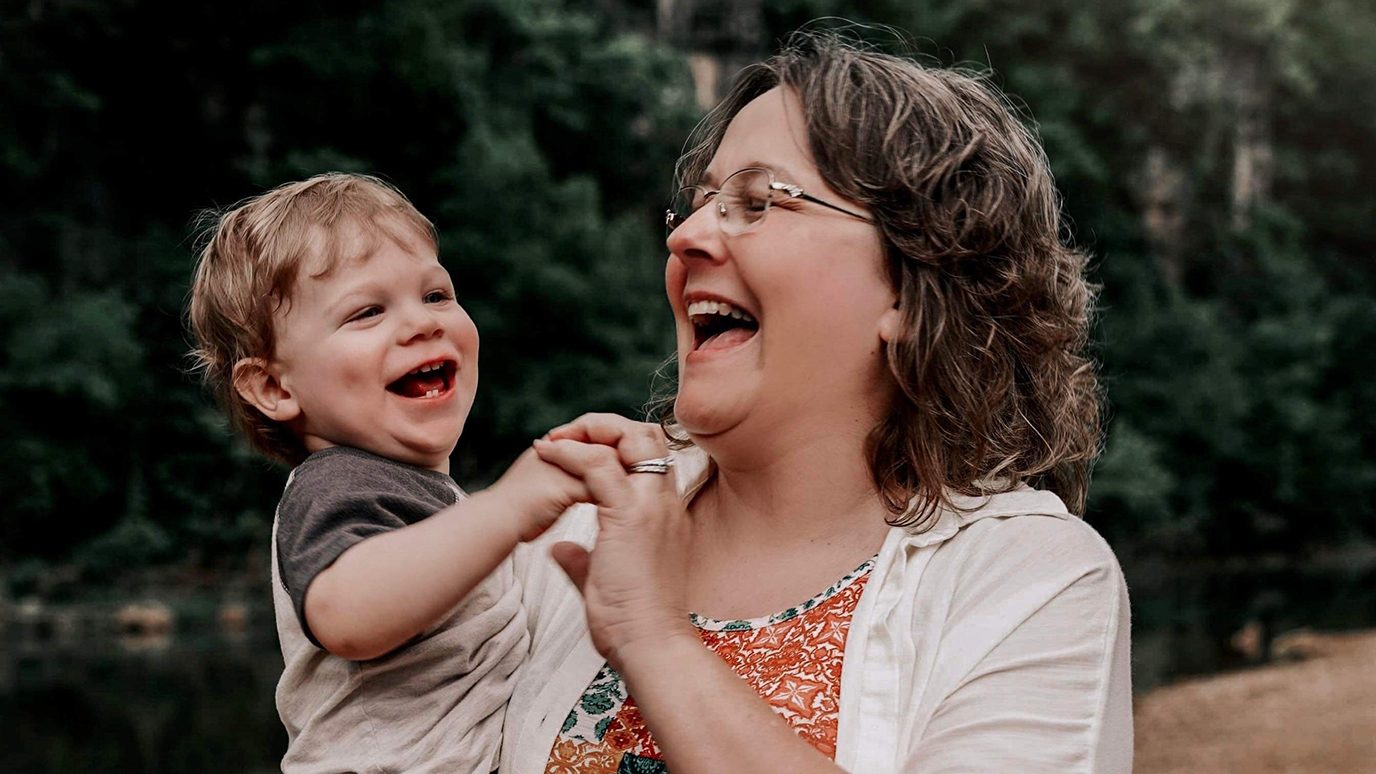 Breast cancer survivor Debbie Wade with her grandson, Henry
