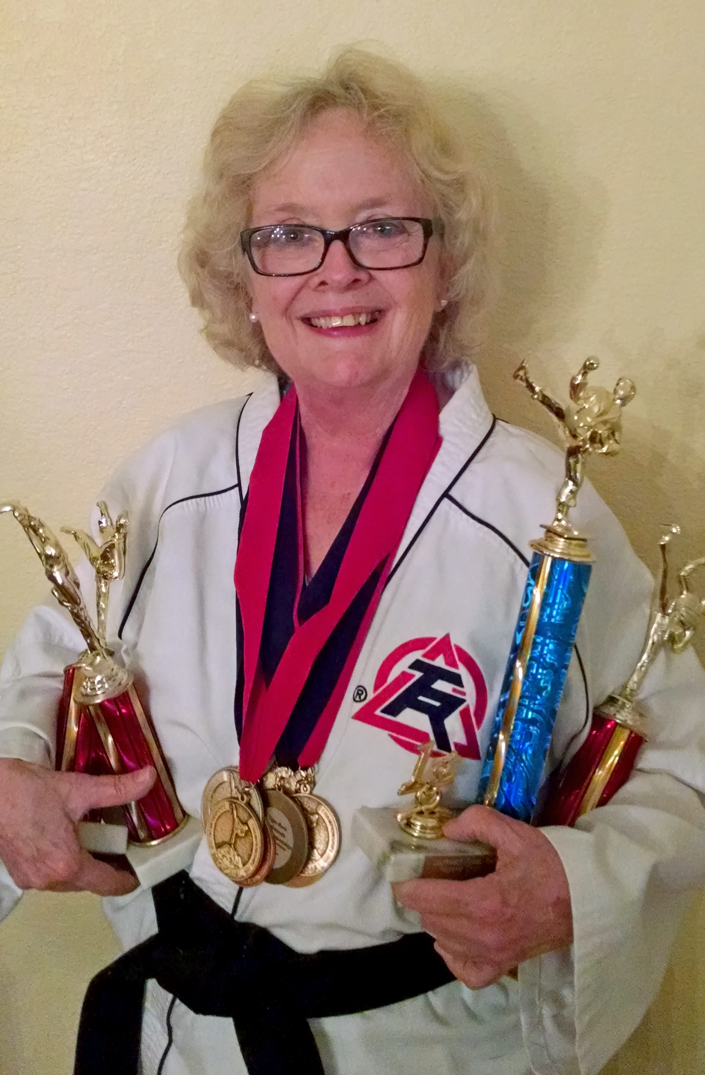 Taekwondo champion Paula Johnson is back in action after beating acoustic neuroma.