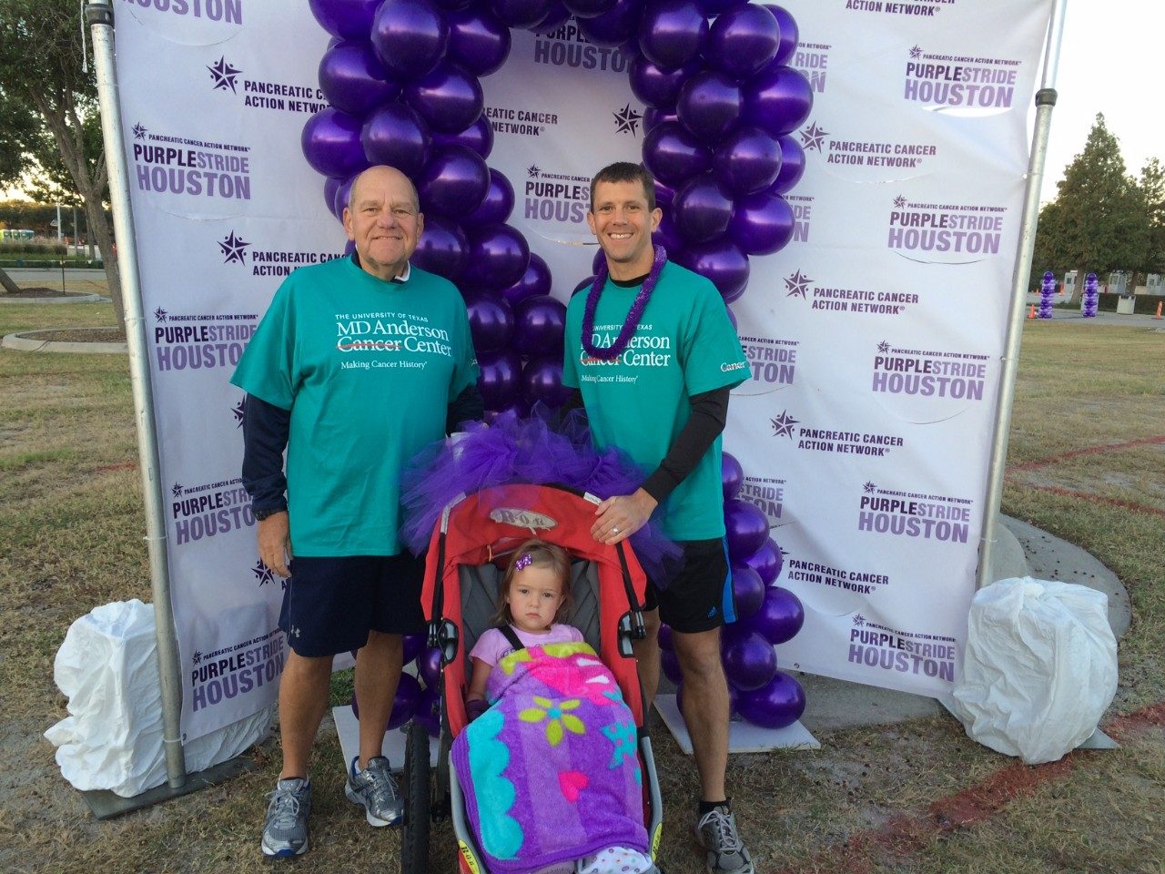 Cancerwise blog post: endoscopic mucosal resection surgery survivor Brian Folloder with his son and granddaughter