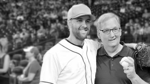 Collin McHugh wraps his arm around his dad -- a prostate cancer survivor -- during a baseball game