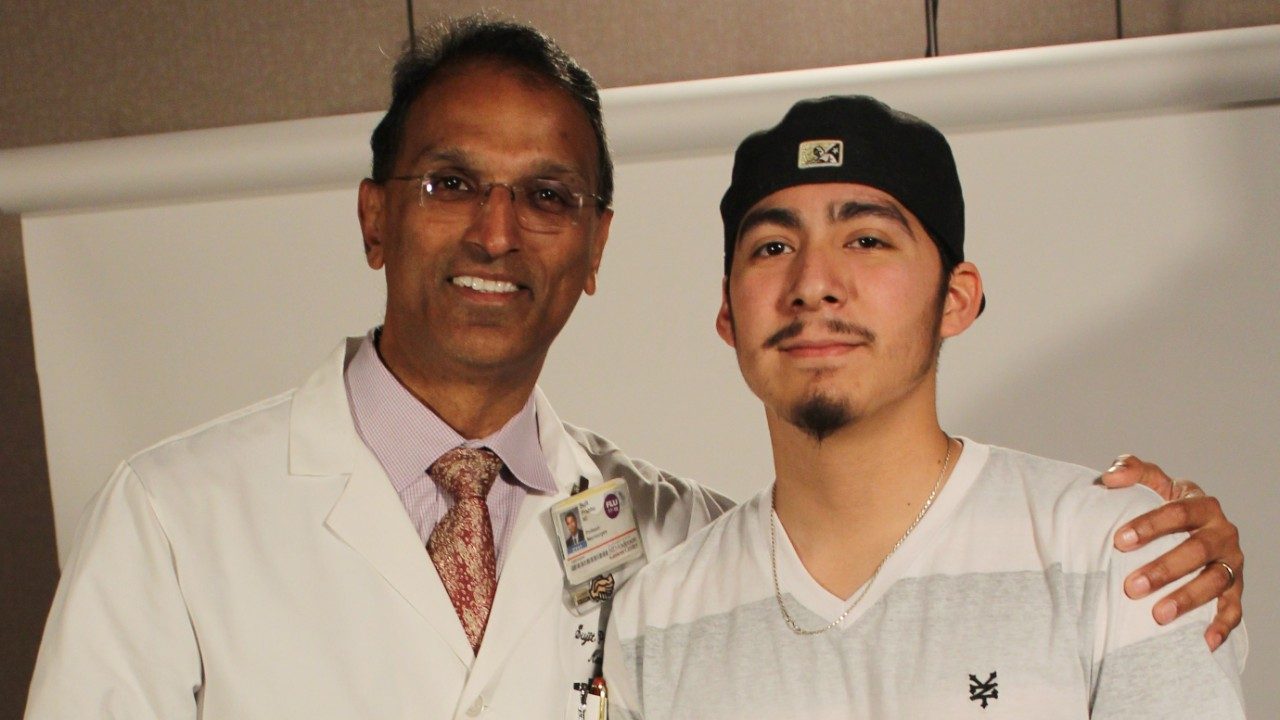 Brain tumor survivor Robert Alvarez with Sujit Prabhu, M.D., who performed his awake craniotomy