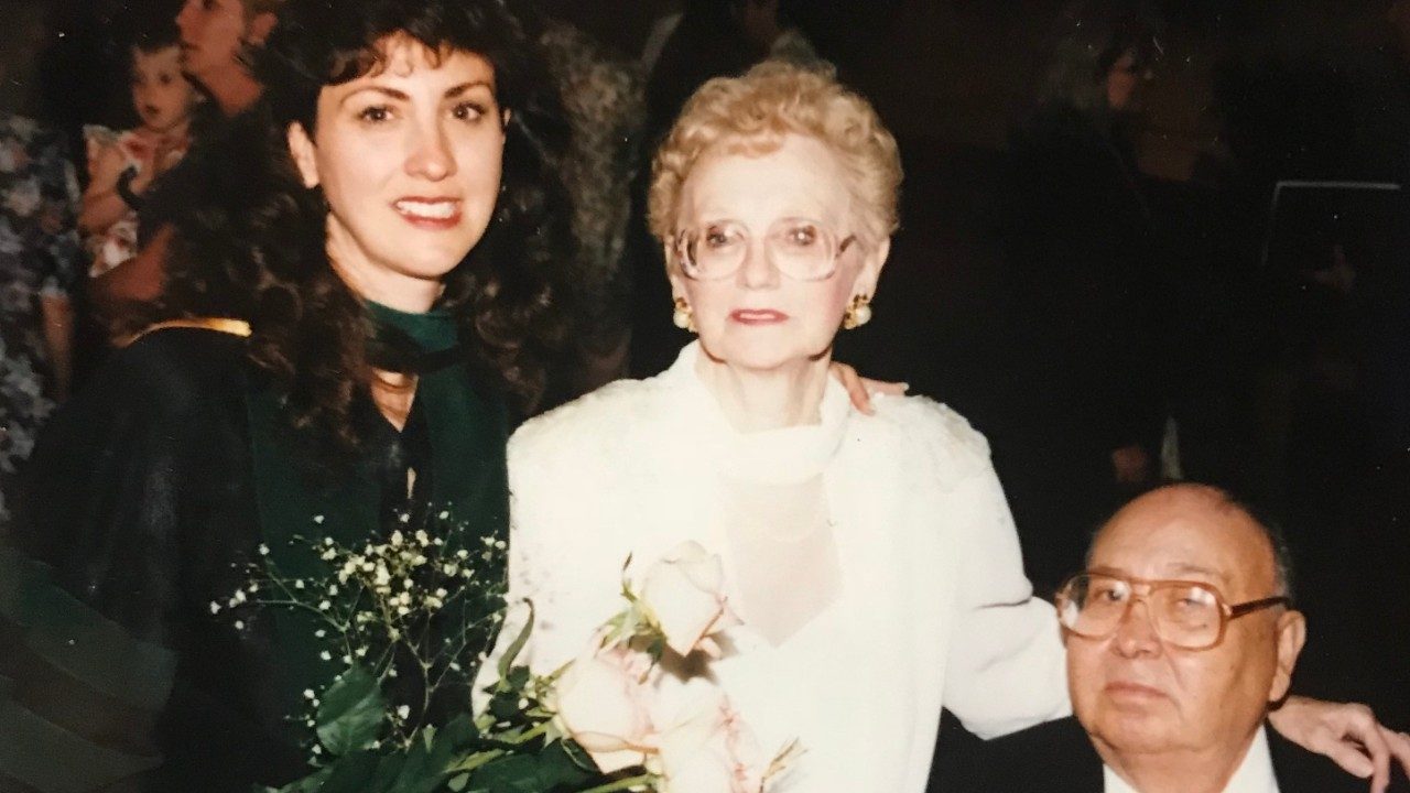 Pamela Schlembach, M.D., poses with her parents.