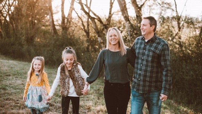 Stage IV lung cancer survivor Amanda Nerstad with her family