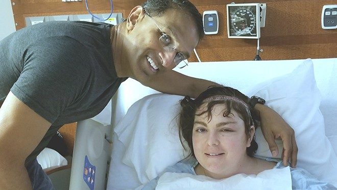 Brain tumor survivor Kellilyn Monar with her neurosurgeon, Sujit Prabhu, M.D.