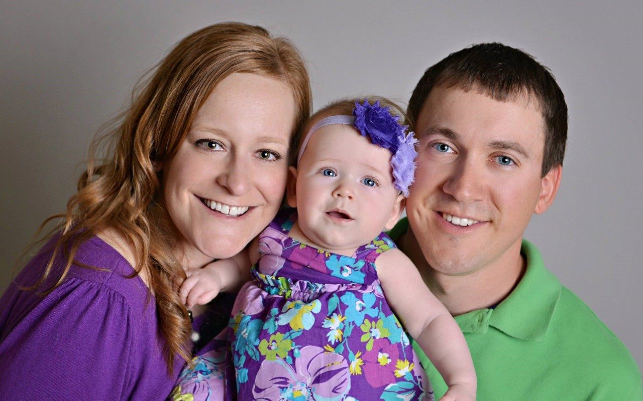 Melanoma survivor Ashley Seykora with her family