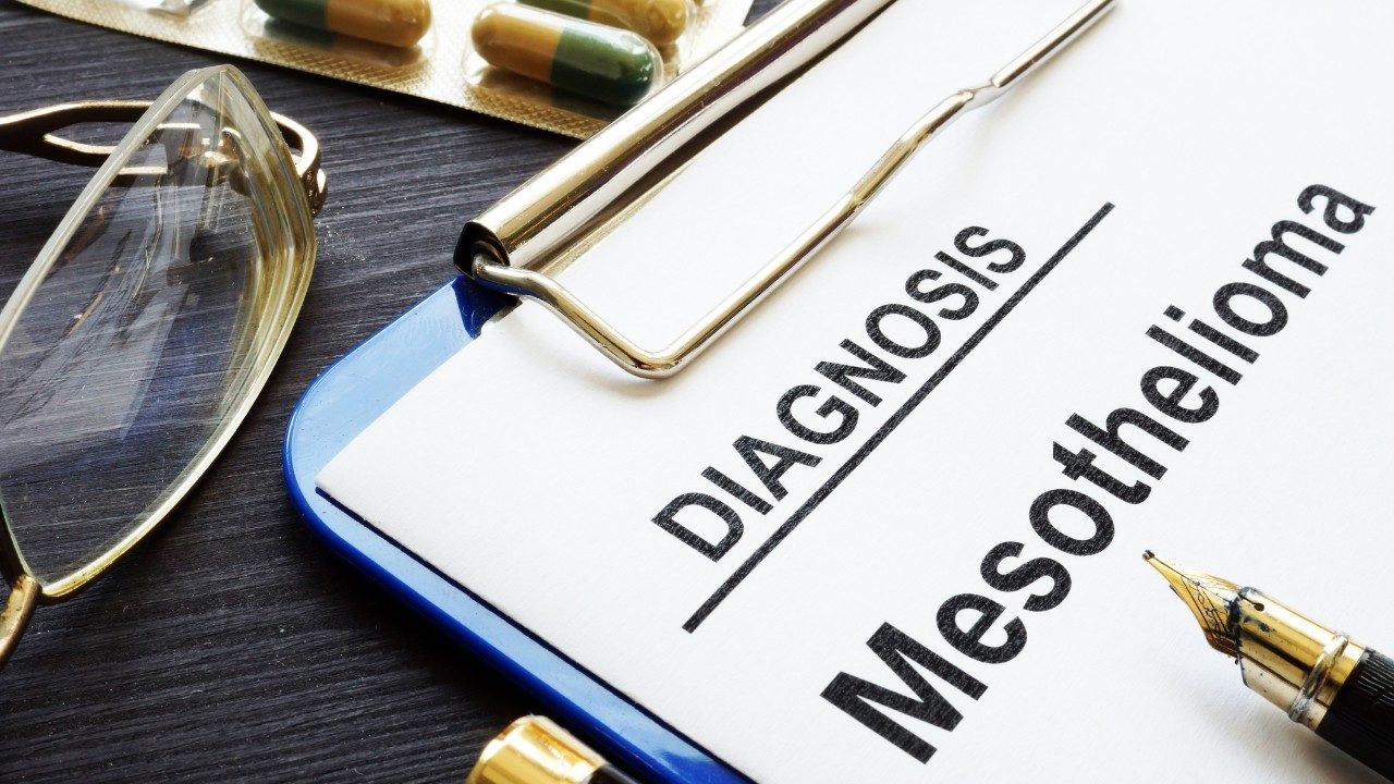 Clipboard with mesothelioma diagnosis written on paper
