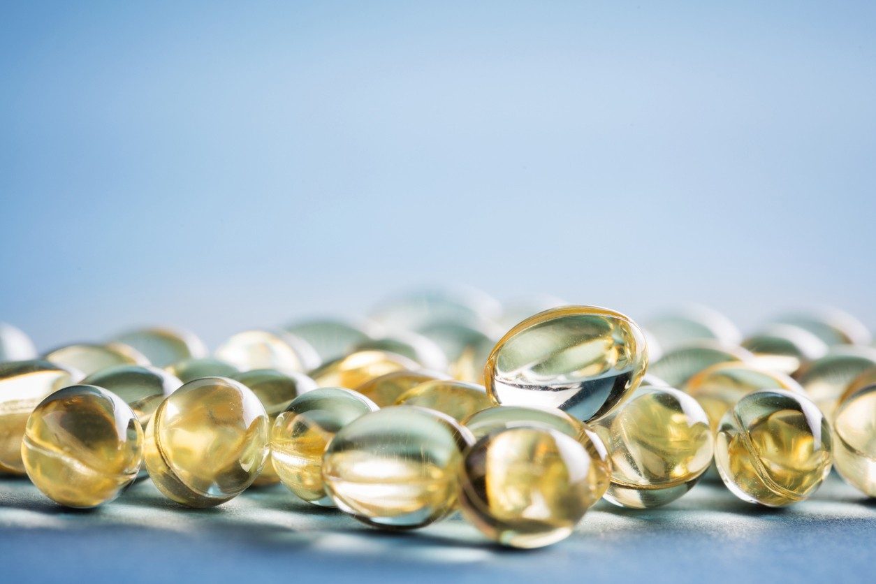 Vitamin D capsules on a table