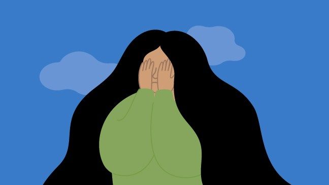 Overhwhelmed lady with hands over face 