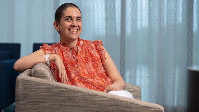 Breast-cancer survivor Tenchita Urteaga smiles.