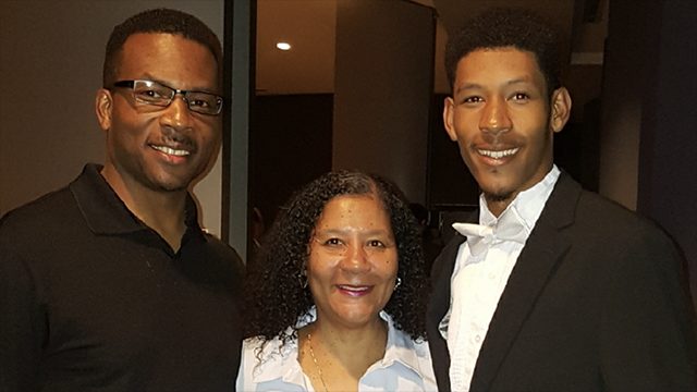 Germinoma tumor survivor Eric Roberson Jr. with his parents, Eric Sr. and Paulette Roberson