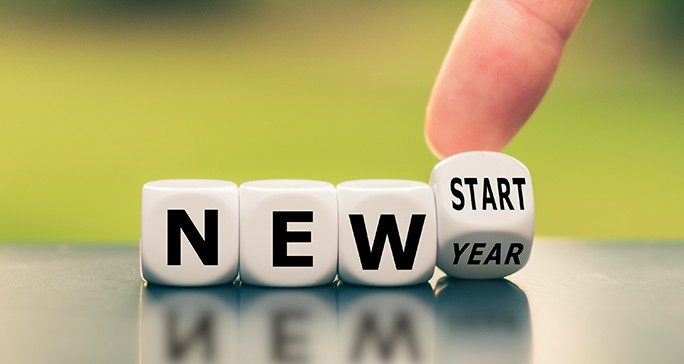 Photo shows the words new year, new start.