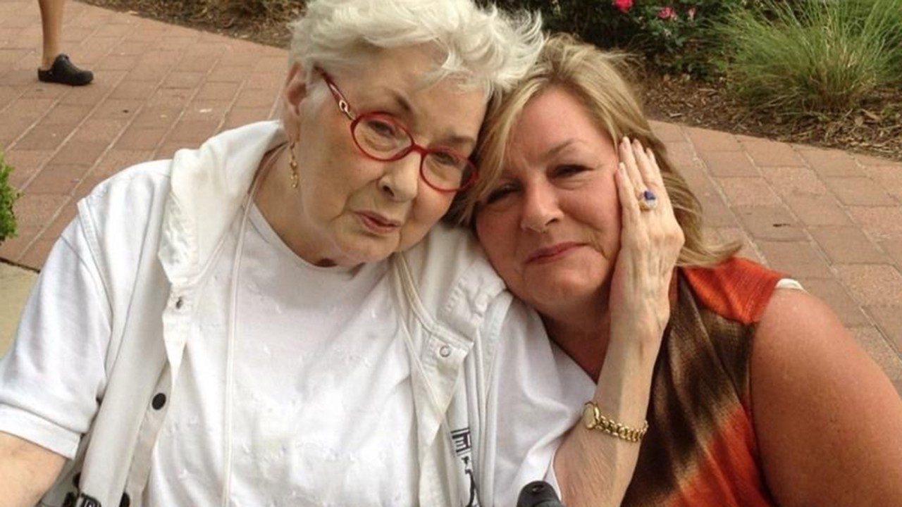 Breast and ovarian cancer survivor Carol Arnhart (right) with her late mother, Nancy Henson, in 2014