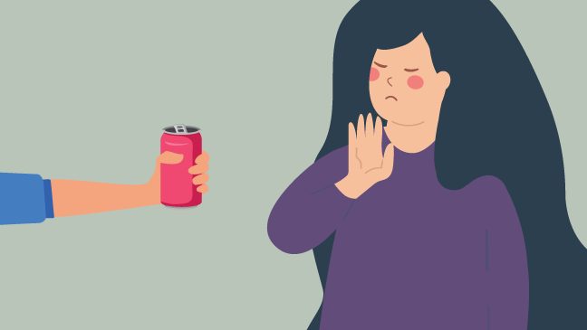 Woman refusing a can of soda offered by an outstretched hand