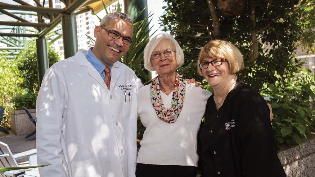 MD Anderson Hepatitis patient Jan Barbo, with Harrys Torres, M.D., and clinical nurse Ruth Roach