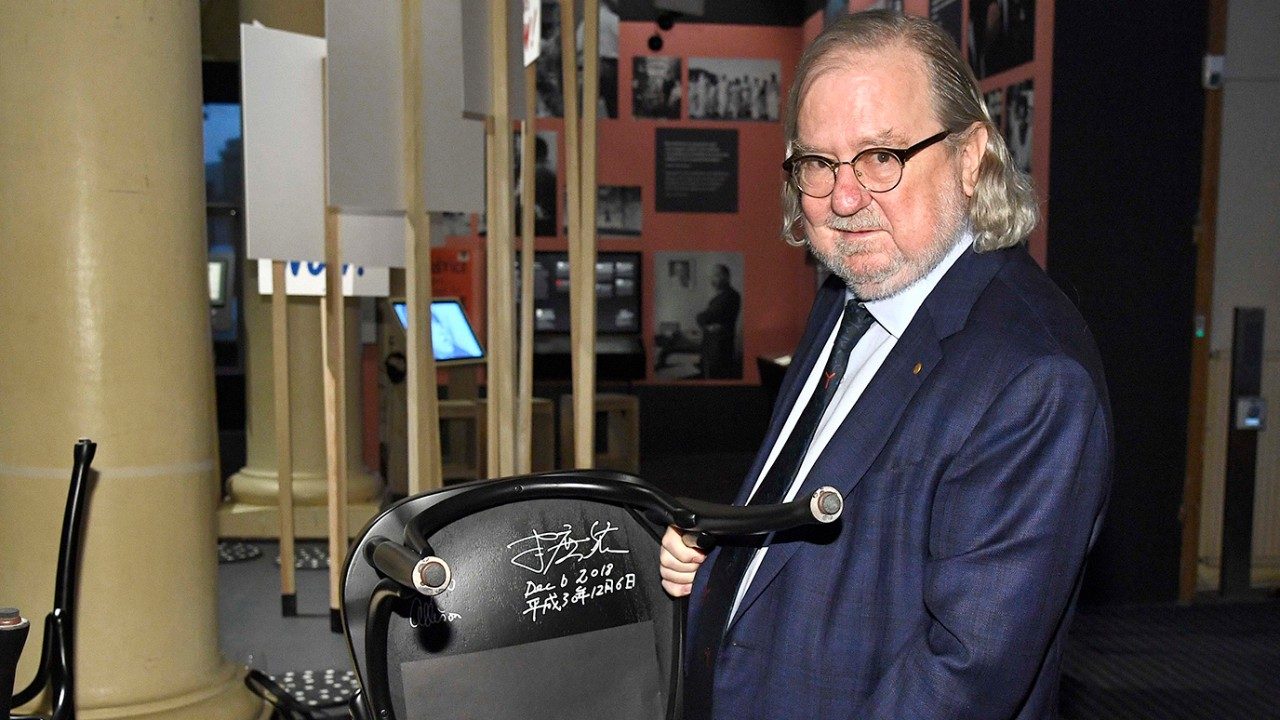  Jim Allison, Ph.D., signed the bottom of a chair at Bistro Nobel in the Nobel Museum in Stockholm