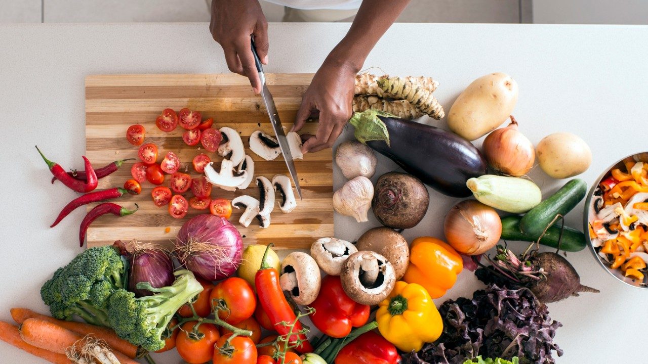 Selection of vegetables on a chopping board. 