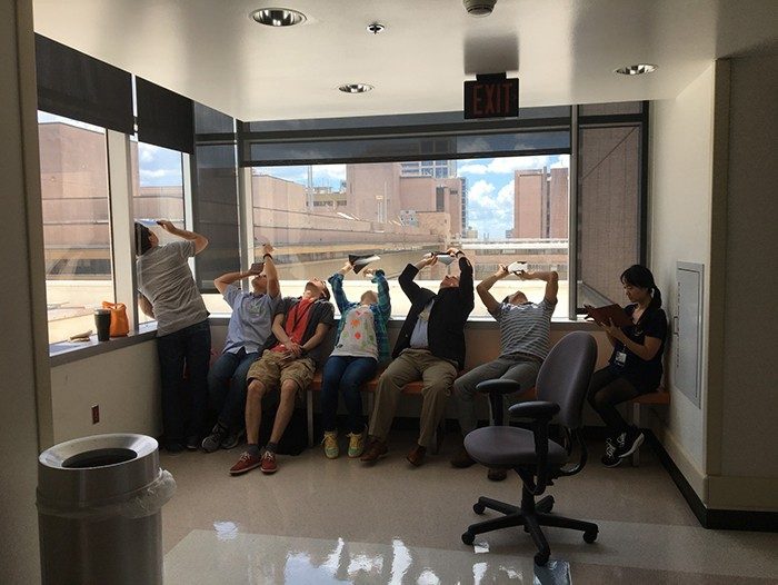 Tainer Laboratory members view the solar eclipse in August 2017